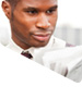 Photo of man reading newspaper.